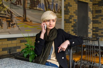 Young girl using her phone