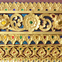 traditional Thai style art gold painting pattern on the wall