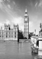 The Palace of Westminster with Elizabeth Tower and Westminster Bridge, London, UK.  Black and White