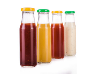 Bottled sauces. On white, isolated background.