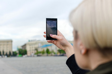 Young girl makes selfie