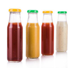 Bottled sauces. On white, isolated background.