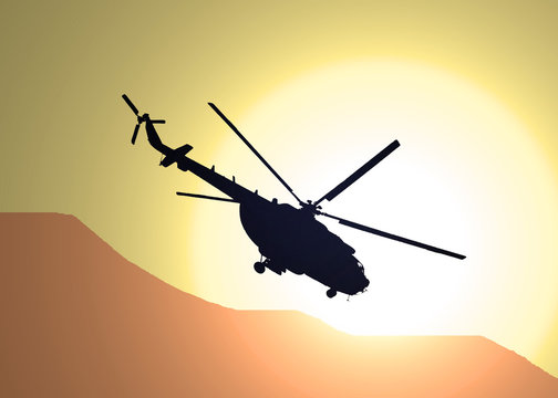illustration of silhouette of military helicopter MI-17 flying over the desert in the sunset