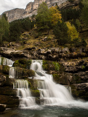 Fototapeta na wymiar Waterfall in Pyrenees mountains