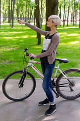 Fototapeta premium Young girl with a bicycle