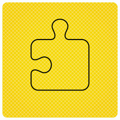 Obraz premium Puzzle icon. Jigsaw logical game sign. Boardgame piece symbol. Linear icon on orange background. Vector