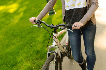 Young girl with a bicycle