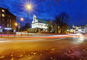 Fototapeta na wymiar The street, and the church in Gliwice, in the evening.