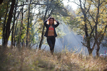 girl autumn forest posing