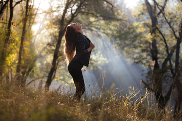 girl autumn forest posing