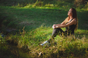 girl on the grass sitting