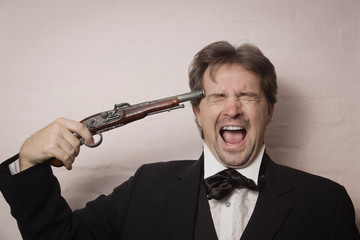 Victorian style man shooting himself