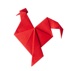 Red fire paper folded rooster handmade origami craft on white background isolated © mykolastock