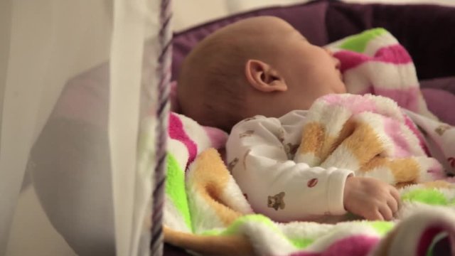 baby sleeping in crib
