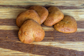 Composition with Lined gingerbread on the wooden background
