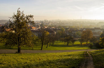 View of Prague from a height of Petrin hills at dawn of the day, autumn landscape, Czech Republic