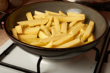 potatoes fried in a pan