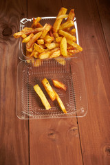 Fried potato chips in plastic packaging