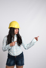 Attractive woman with a yellow helmet