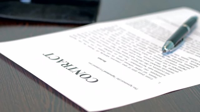 A contract waiting to be signed, the contract lies on a table with a fountain pen, no people, generic contractual language, panning move