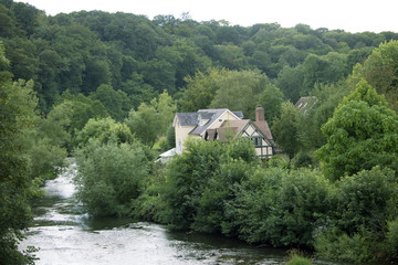 House in the Woods Near a Stream in Ludlow, England