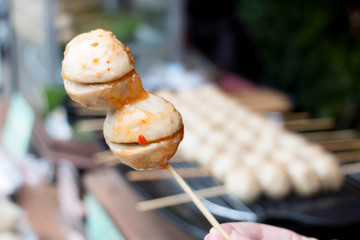 grilled meatball with spicy sauce