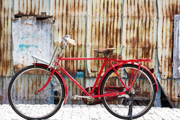 Naklejka na ściany i meble Old retro bicycle on the street