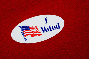 "I Voted" Sticker" On Red Background Representing Republicans

