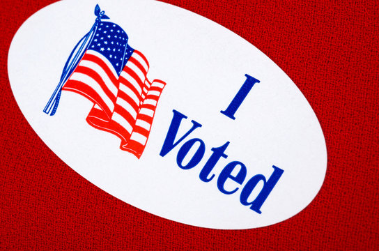 "I Voted" Sticker" On Red Background Representing Republicans

