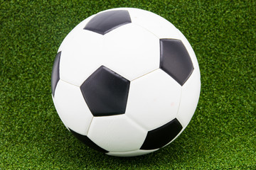 Fototapeta premium soccer ball on soccer field