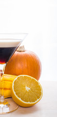 Pumpkin Spice Cocktail On a White Background With Pumpkins And Orange