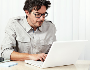 Man working with laptop.