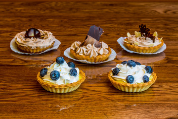 small dessert pies with fruits on top © Omar Ortiz