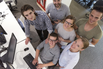 startup business people group working as team to find solution