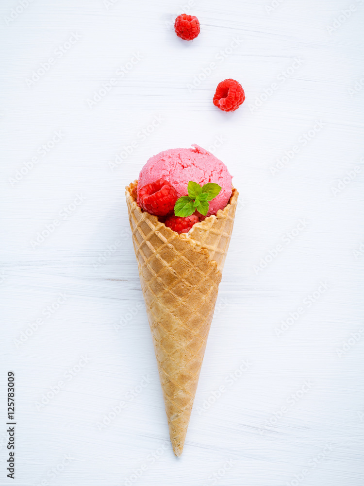 Poster Raspberry ice cream in cone with fresh raspberry and peppermint