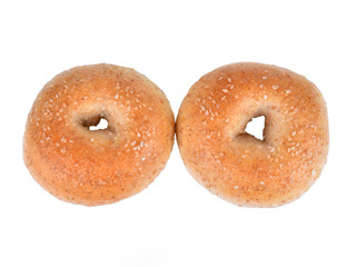 Sesame seeded bagel viewed from above isolated against white