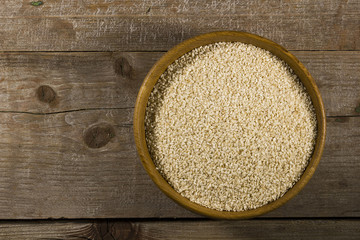 Sesame seeds in a wooden bowl