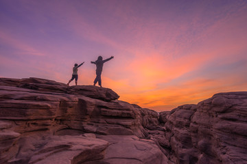 sunrise in the mountain  Sam Phan Bok (3000 holes) with two peop
