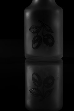 Silhouette of the white lines of a snorter on a black background.