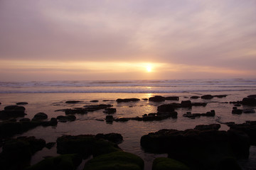 Golden sun setting on the Pacific Ocean