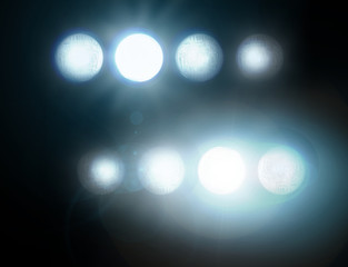 Stadium lights against dark night