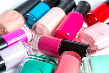 group of nail polish on wooden background