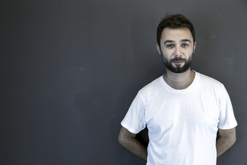 Young handsome man with beard studio portrait