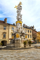 Obraz premium Trinity column (plague column) on Hauptplatz in Baden bei Wien, Austria.