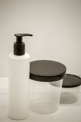 Jars for cosmetics on a white background