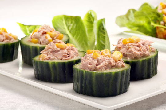 Cucumber Appetizer With Tuna And Corn On White Background