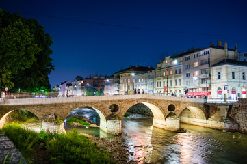 View of the latin bridge and historic centre of Sarajevo - Bosnia and Herzegovina in the night