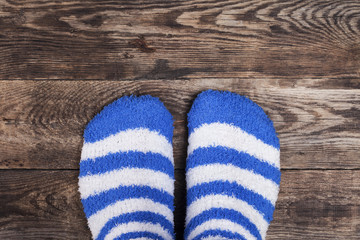Blue Socks on Wood Background