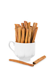 cinnamon stick in white cup.