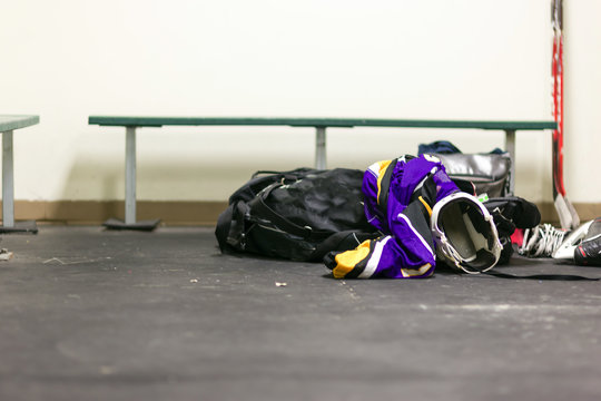 Ice hockey gear in a locker room